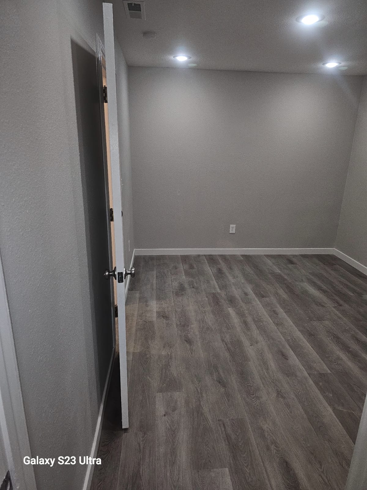 Close-up of the wooden floor finish in a hallway