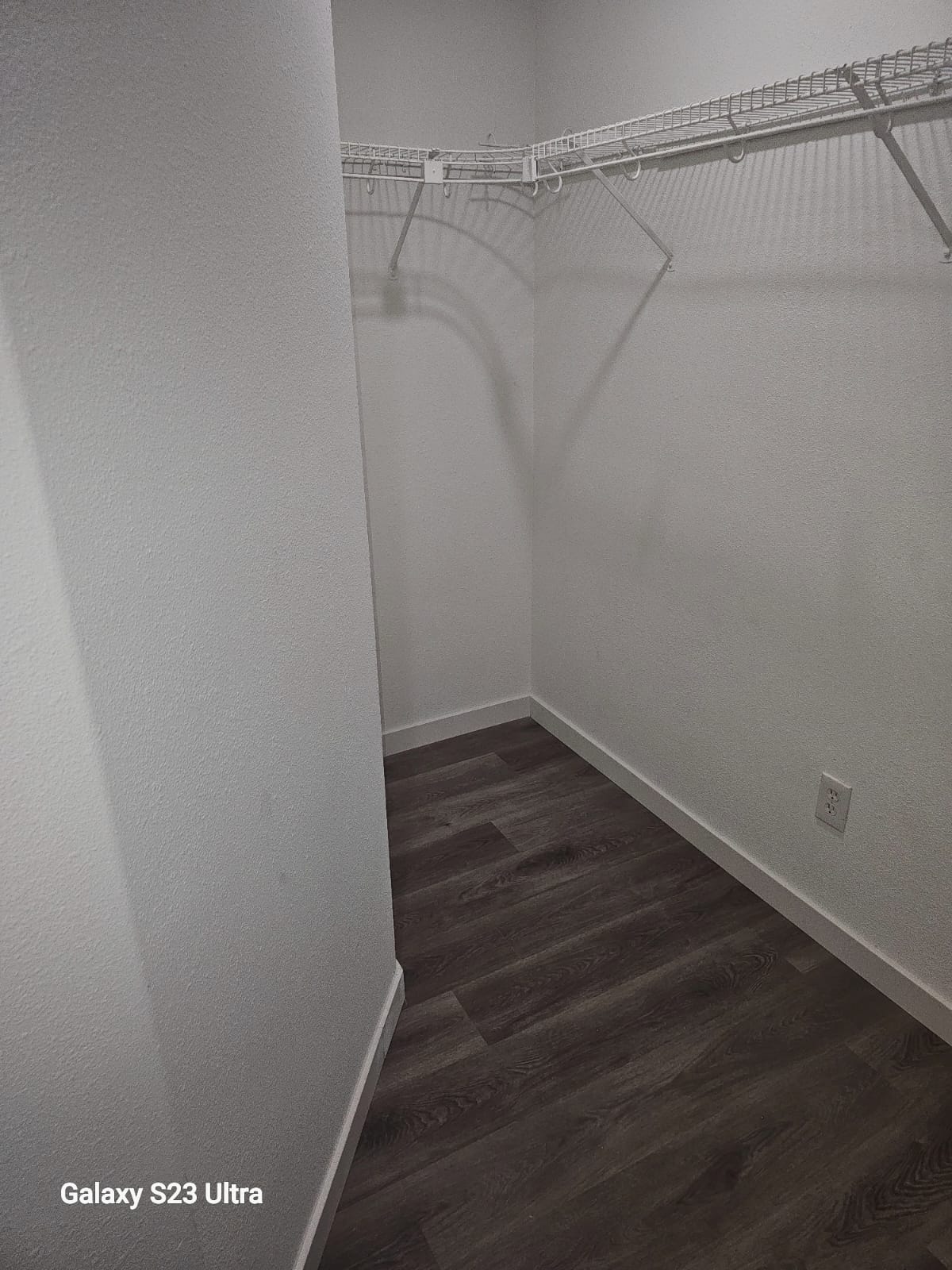 Hallway transformation with elegant wood flooring