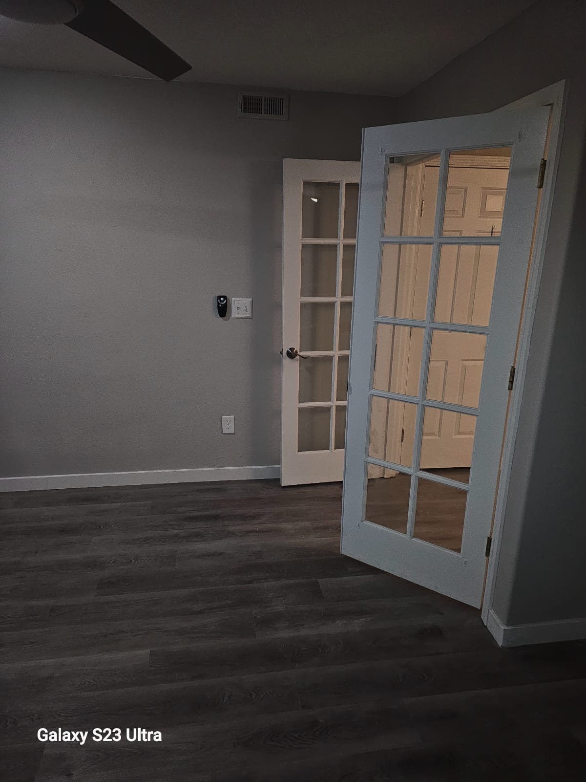 Spacious hallway with elegant flooring