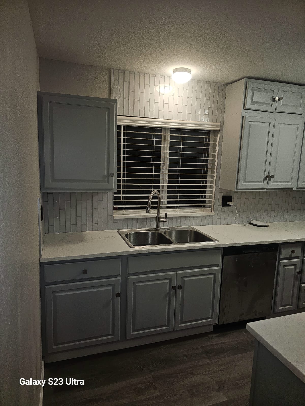Close-up of new kitchen cabinets and backsplash